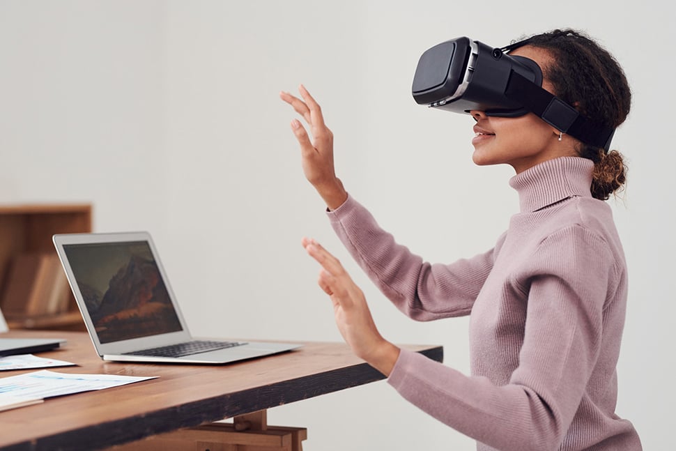 A woman wearing a virtual reality headset