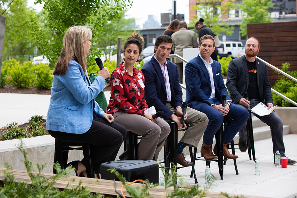 Four real estate and development professionals speaking on the May Outdoor Speaker Series panel, moderated by Mindgrub's Todd Marks