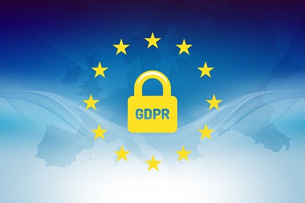 Blue faded map of Europe in the background. 12 yellow stars circling a yellow padlock with the letters "GDPR" in the foreground.